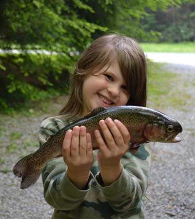 little girl with fish 400x448
