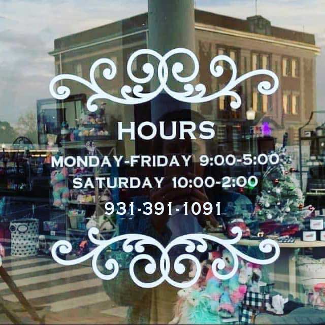 Hours of service and the current phone number are on the front door of the old Bank Building in Linden